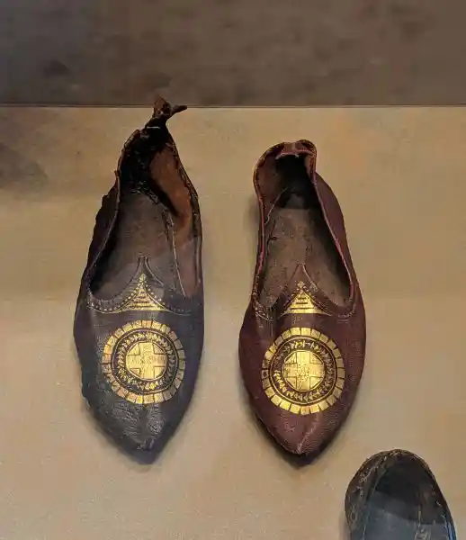 Pair of early Byzantine leather shoes with gold-leaf decoration